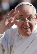 Pope Francis waves to crowds as he arrives to his inauguration mass on 19 March 2013.